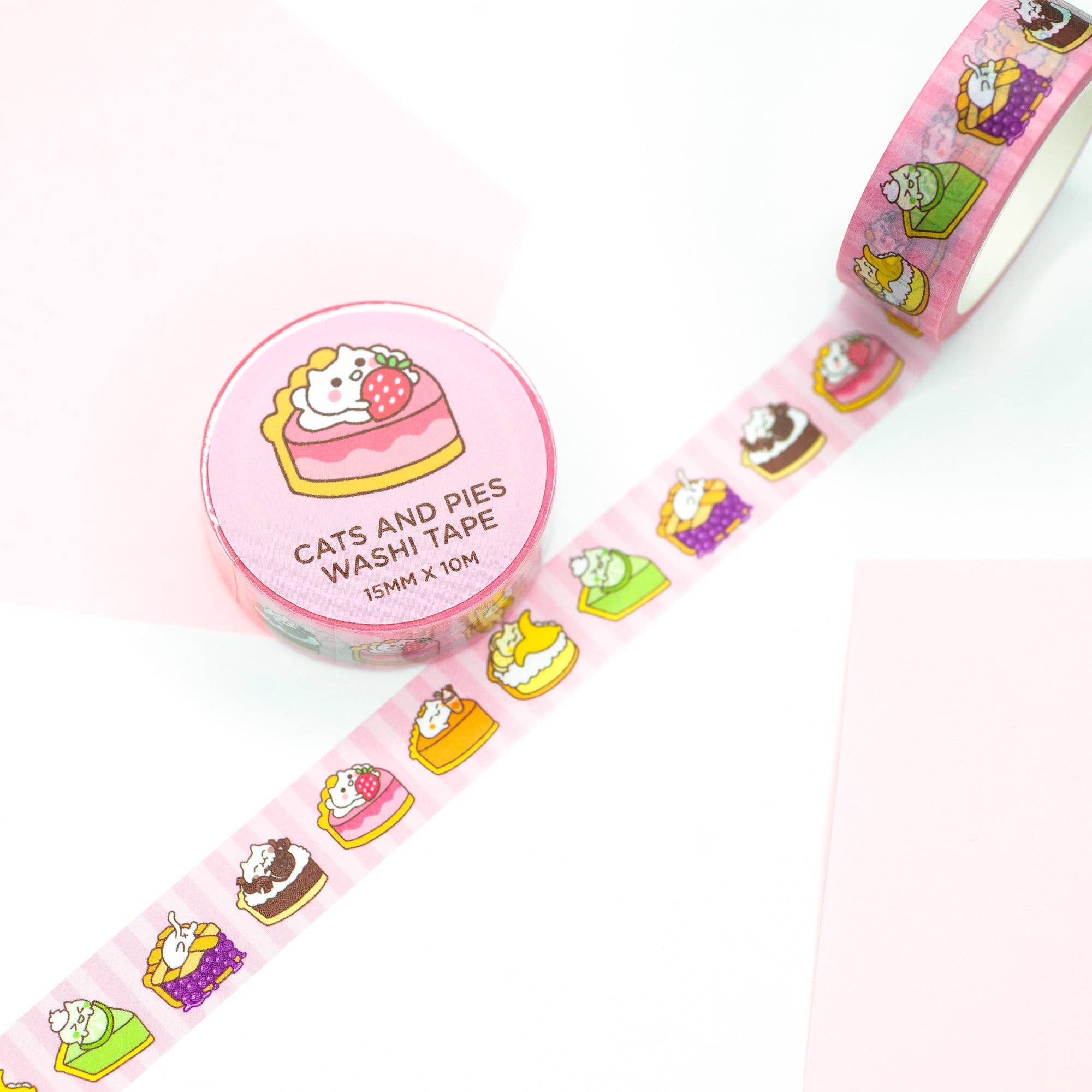 Washi tape with cat and pie design on a white background