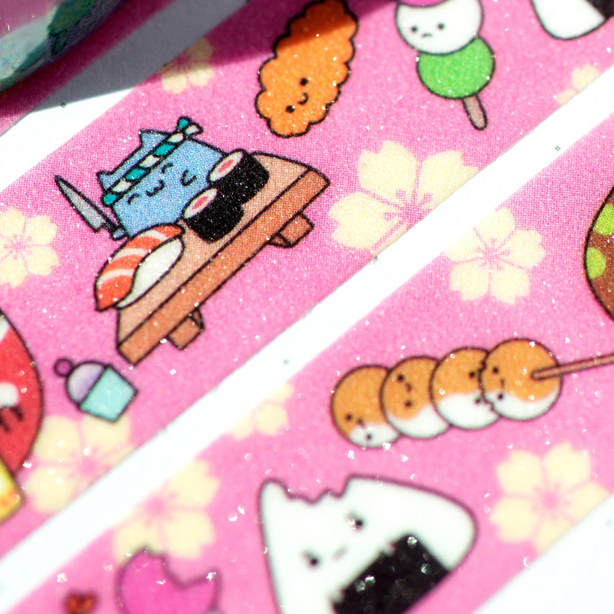 Cartoon food characters on pink washi tape with flowers
