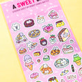 Sticker sheet with cute food-themed designs on a pink background