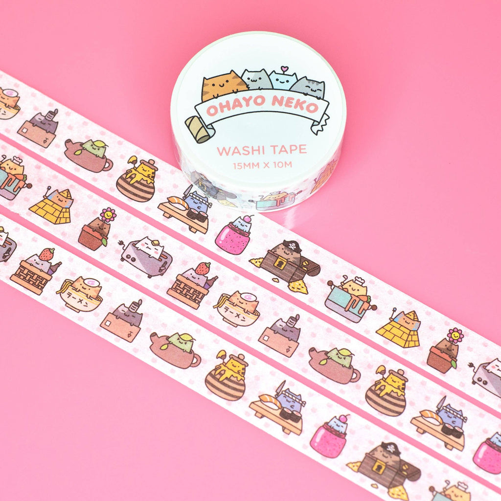 Washi tape with cute cat-themed design on a pink background
