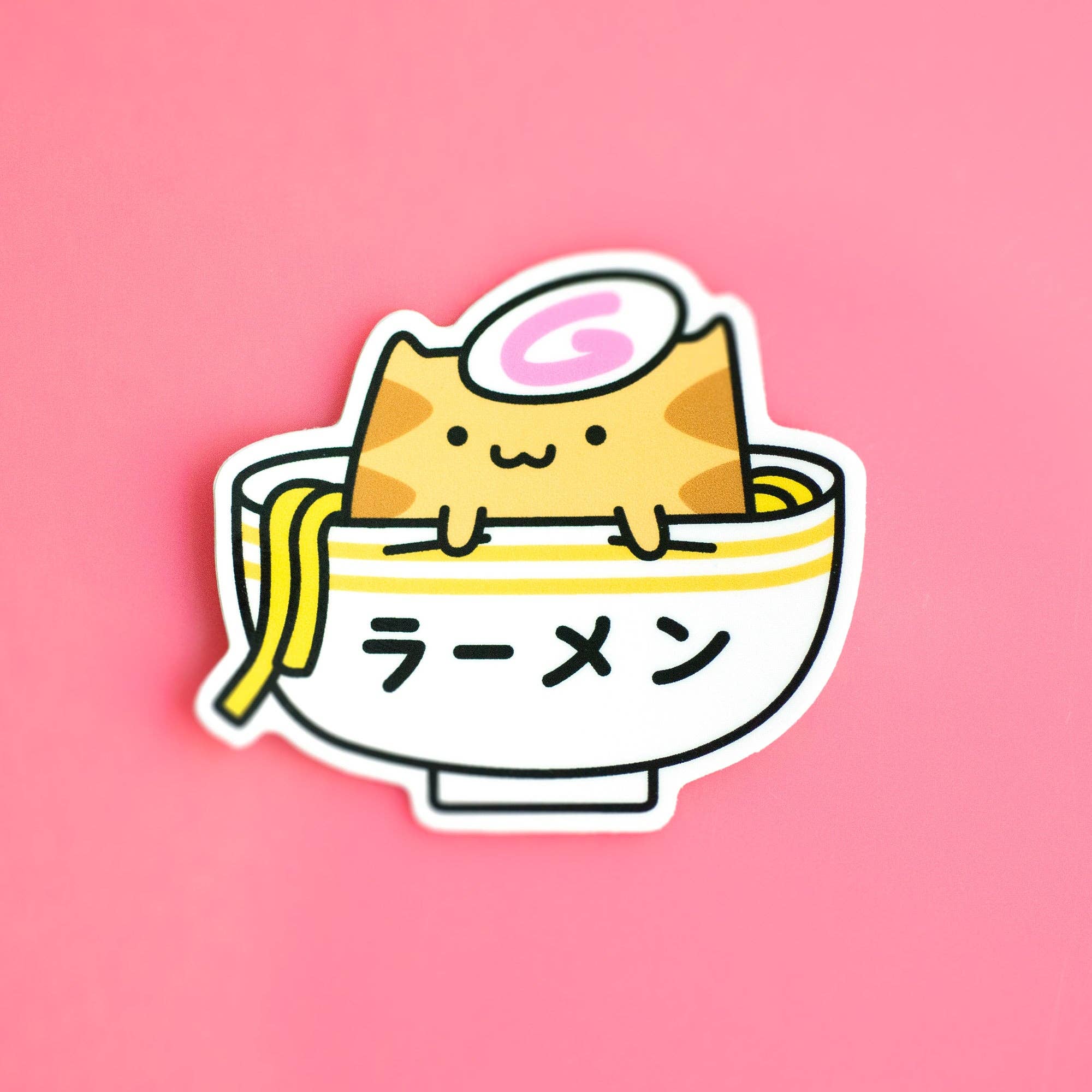 Cartoon cat in a bowl of ramen with a pink background